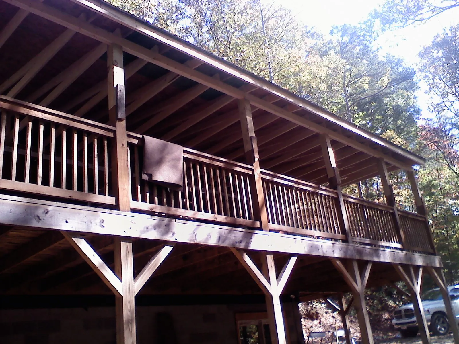 Timber framing under a new elevated porch and deck — Roof Leak Repair in Arkport by Roofing Brothers